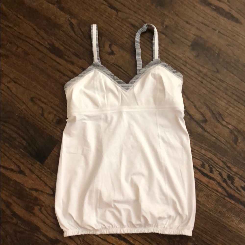 Lululemon white tank top with grey trim. Size 8